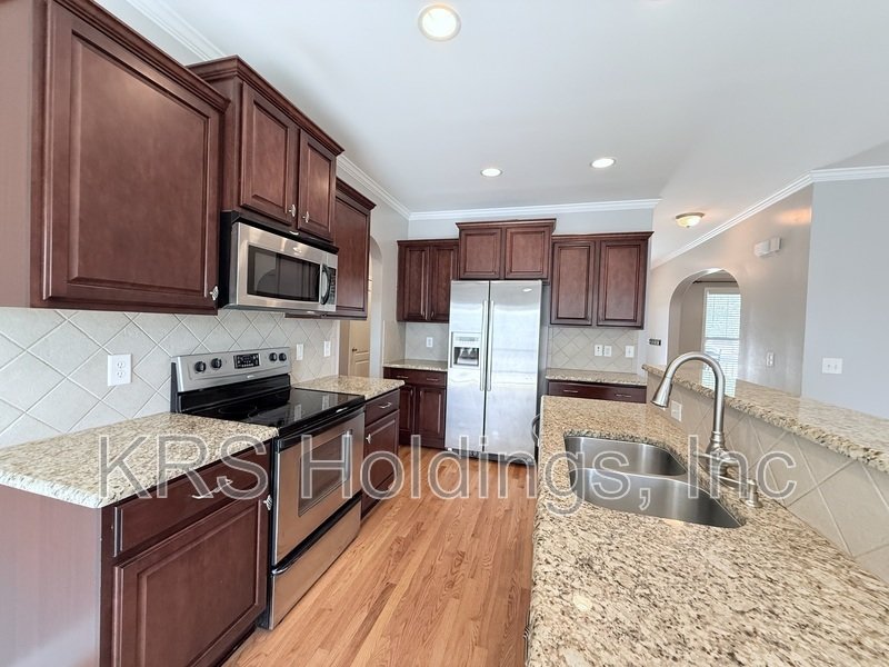 Spacious Home with Fenced Backyard, Bonus Room & Private Third-Floor Suite property image
