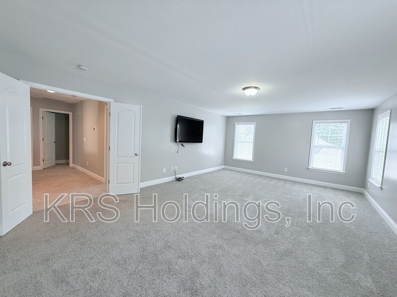 Spacious Home with Fenced Backyard, Bonus Room & Private Third-Floor Suite property image