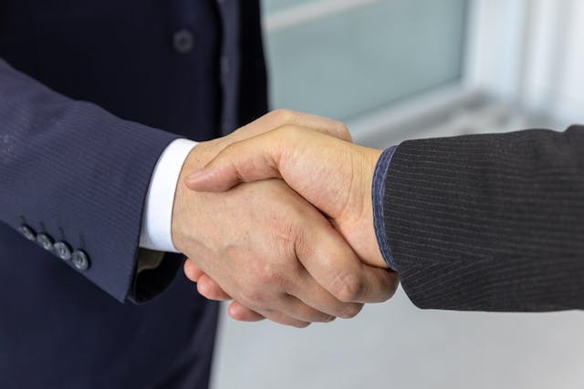 Two people shaking hands 