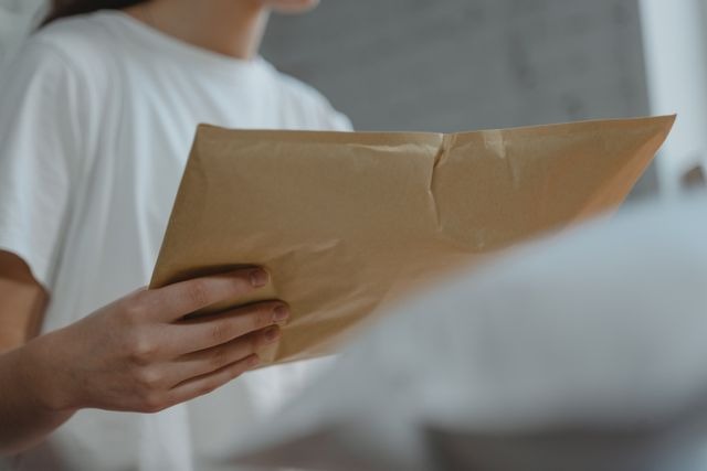 person holding a package