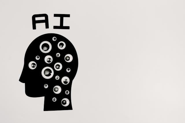 silhouette of head with word AI spelled above it