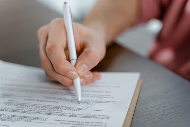 Person Signing a document
